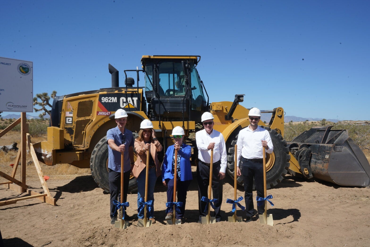 Board of Directors, General Manager and Project Manager with shovels